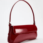 Borsa baguette con finitura lucida